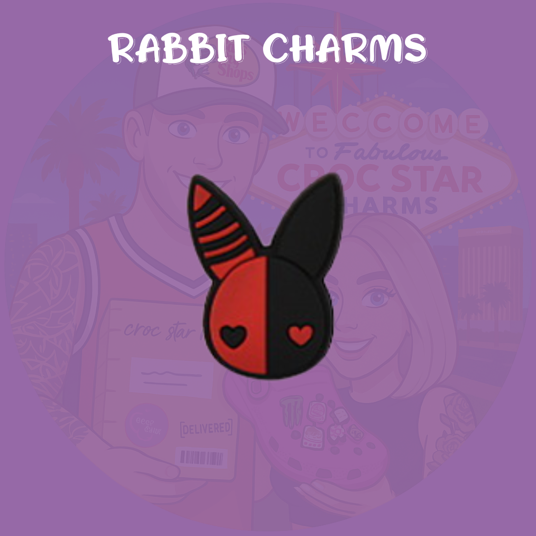A striking pair of Croc charms featuring a stylized rabbit character in bold red and black colors. The design includes long ears, expressive eyes, and a playful or edgy cartoon style, made from soft rubber for easy attachment to Crocs.