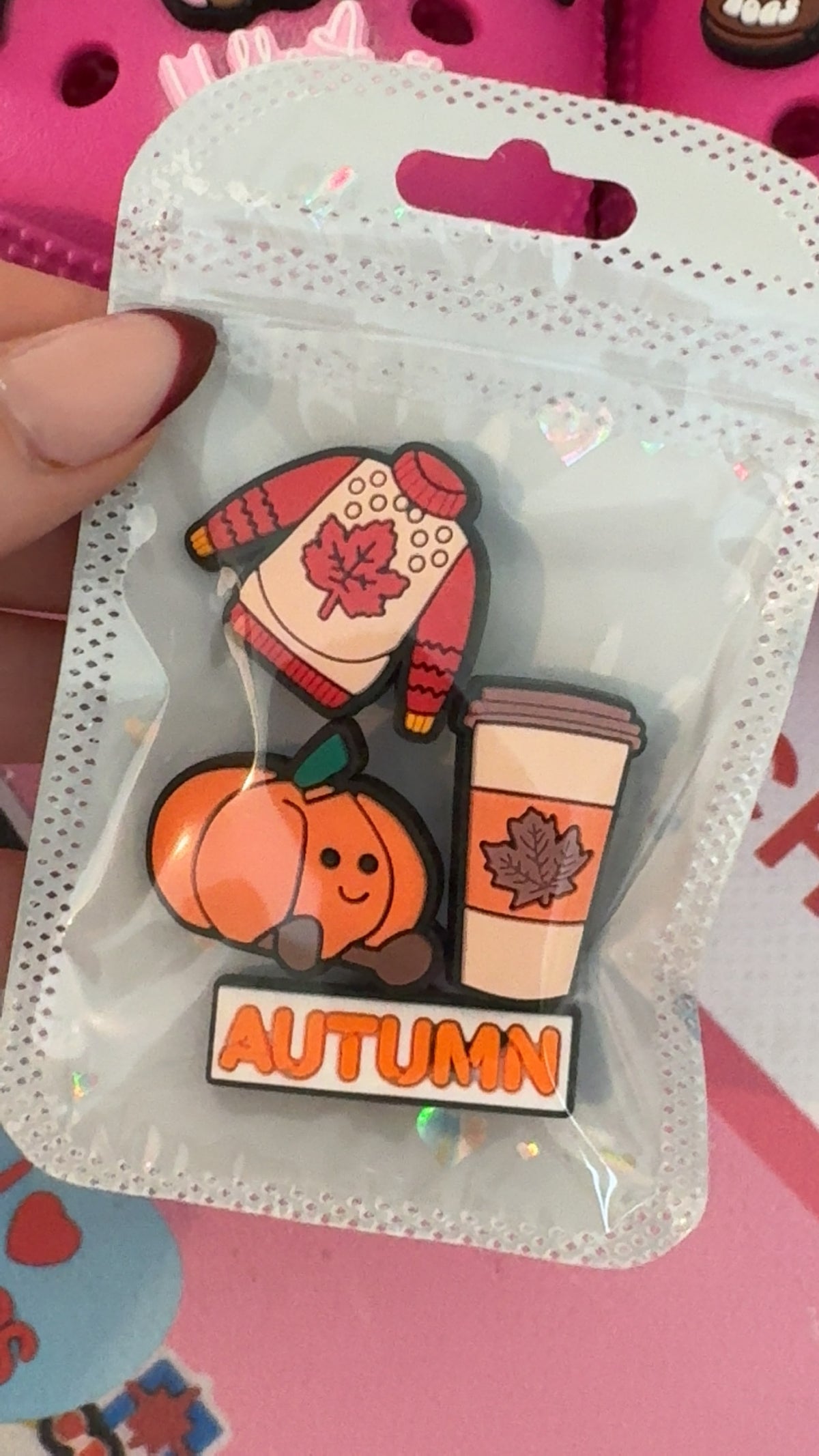 Four-piece autumn shoe charm set featuring a pumpkin, coffee cup, cosy jumper and AUTUMN slogan