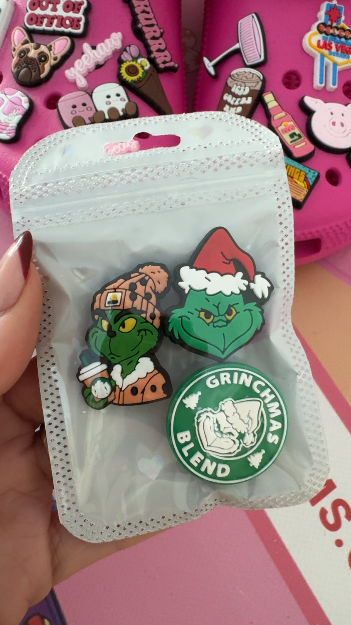 3 piece Grinch Christmas shoe charm set featuring green festive character designs