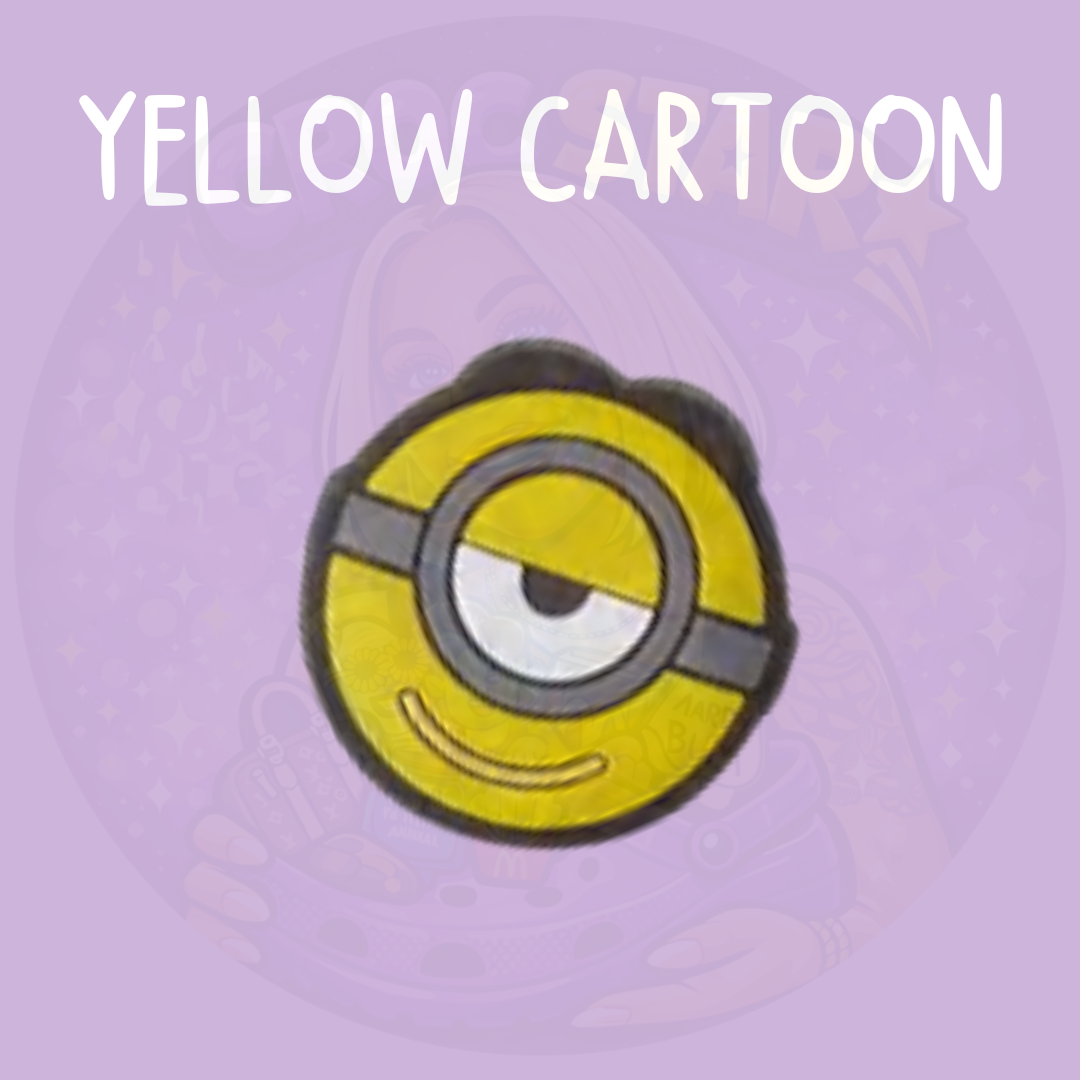 Yellow cartoon character face croc charm