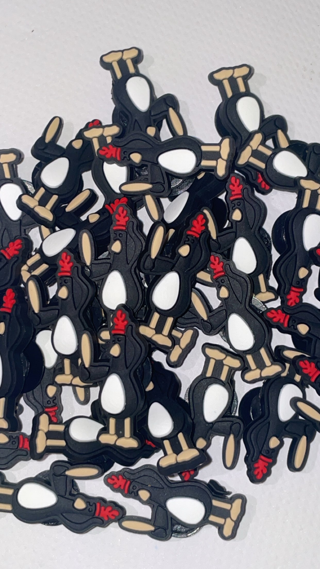 British cartoon-inspired Croc charms set with cheese and dog designs”

“Inventor and pet-themed Croc charms on grey and yellow Crocs shoes”

“Clay animation-style Croc charms flat lay – cheese, teapot, and gadget icons”

“Funny British-inspired Croc charms set for nostalgic fans”

“Cheese and clever dog Croc charms gift set – inspired by classic animation”