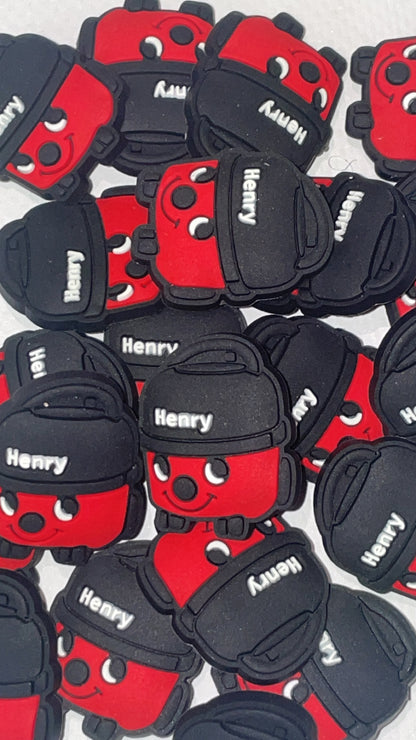 Cute red vacuum-inspired Croc charms set with smiling designs”

“Cleaning-themed Croc charms on black and red Crocs shoes”

“Vacuum and smiley Croc charms flat lay – fun home-themed designs”

“Red vacuum Croc charms gift set – inspired by classic British designs”

“Cute hoover-style Croc charms for cleaners and retro fans”