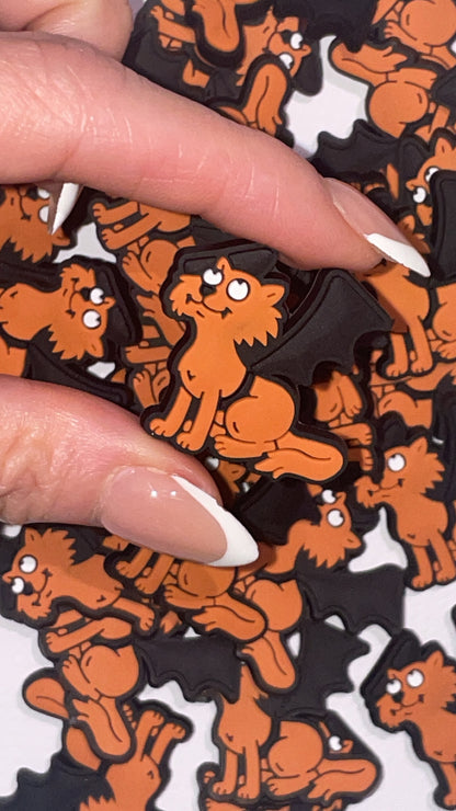 Cute vampire and bat Croc charms set in spooky cartoon style”

“Cartoon-inspired vampire Croc charms on black and purple Crocs shoes”

“Spooky Croc charms flat lay – vampire face, black cat, and star designs”

“Halloween vampire Croc charms set for nostalgic cartoon lovers”

“Cute spooky Croc charms gift set – bats, fangs, and gothic motifs”