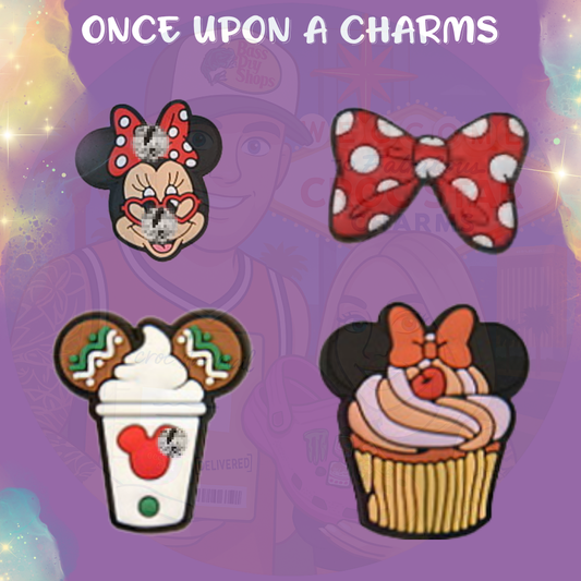 A collection of Croc charms featuring a stylish cartoon mouse character with large round ears, a red polka dot bow, and a classic red dress. The charms are made from soft, colorful rubber and designed to fit snugly into Crocs shoe holes for a playful, themed look.