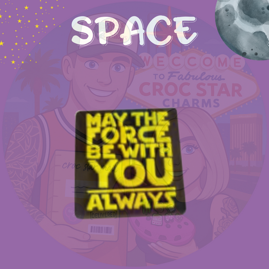 Space-themed Croc charm with yellow text that reads 'May the Force Be With You Always' on a black background, inspired by sci-fi movie quotes

