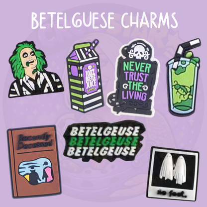 Spooky movie inspired Croc charms featuring a striped supernatural character, Recently Deceased handbook, green drink, gravestone and ghost photography designs