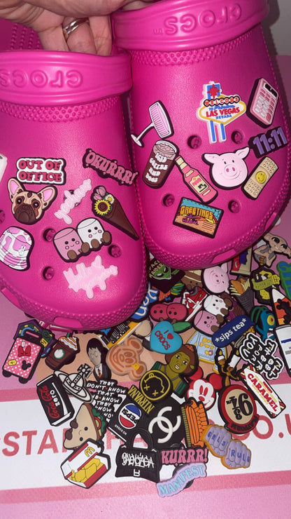 15 random decorative Croc shoe charms in a Fiver Friday mystery bundle