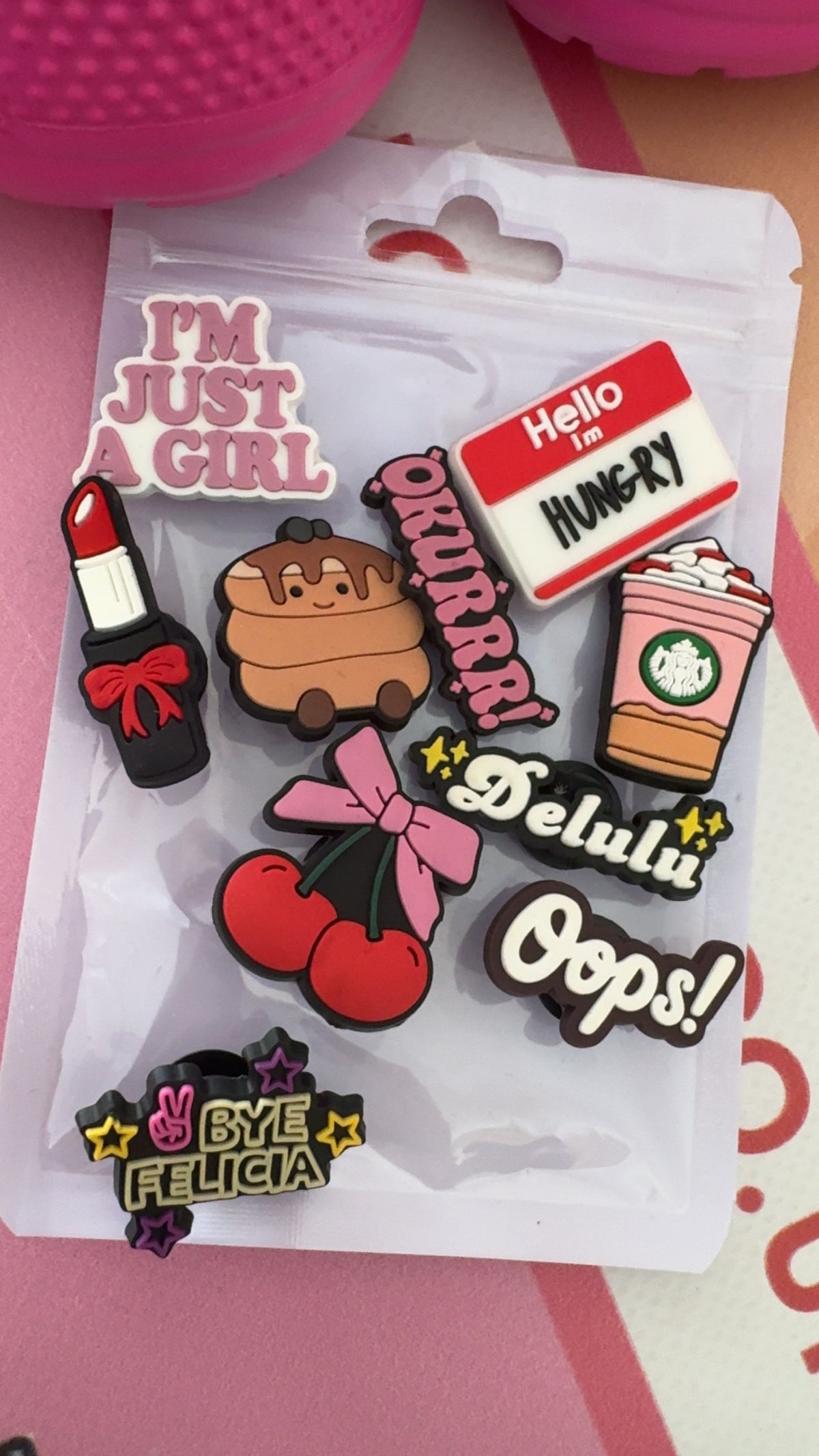 Pink girlie shoe charm collection featuring cherry, coffee, lipstick and fun phrase designs.
