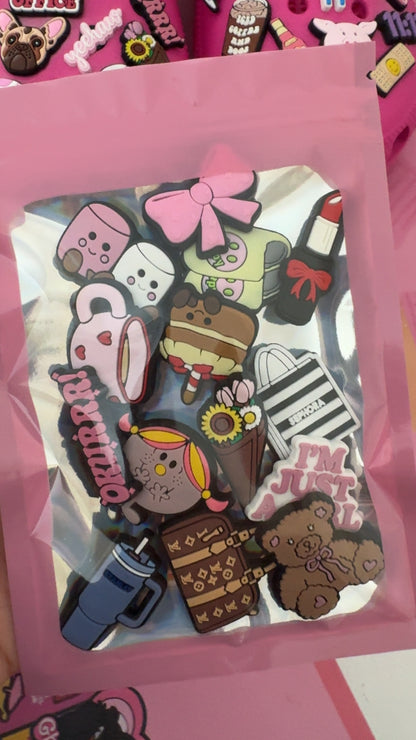 14-piece I'm Just a Girl Croc charm bundle featuring pink, beauty, coffee, shopping, travel and cute lifestyle designs.