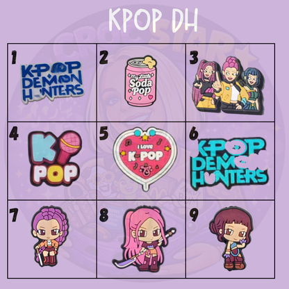Cute K-pop fantasy shoe charms featuring female demon hunter characters, music accessories and colourful supernatural designs