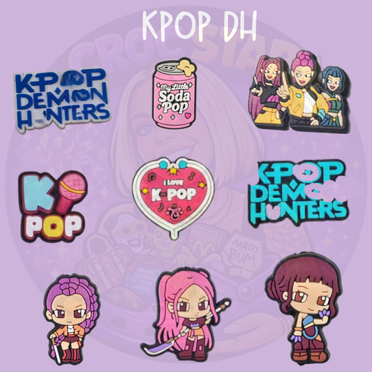 K-pop inspired demon girl Croc charms featuring three female characters, microphones, magical drinks, heart design and supernatural graphics