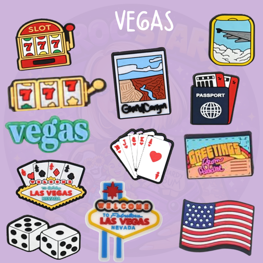 Las Vegas Croc charms featuring slot machines, playing cards, dice, Welcome to Las Vegas sign and travel designs