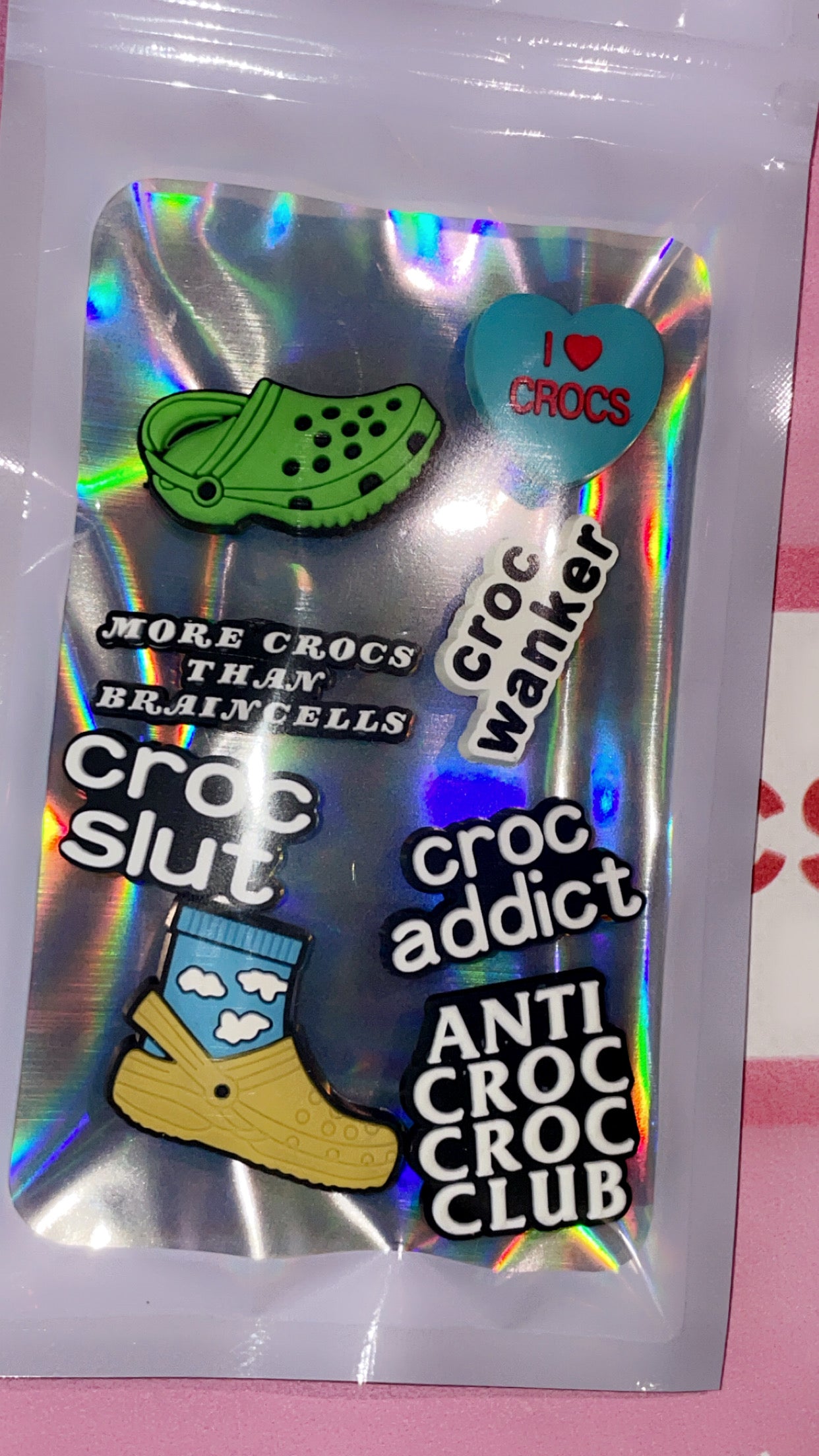 Assorted croc charms collection pack and bundle pack for shoes with colourful decorative shoe charms, themed charms for Crocs™, sandals and footwear accessories, fun and trendy charms set for kids and adults, mixed design croc shoe accessories with hearts, stars, emojis, animals and seasonal motifs, premium collectible pack of shoe charms ideal for personalization, gift set, bulk croc charms bundle memes, croc charms, croc addict, croc charm bundle pack assorted styles for footwear accessories