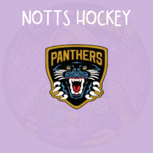 Black and gold panther ice hockey inspired croc charm with fierce panther face design on shield style background