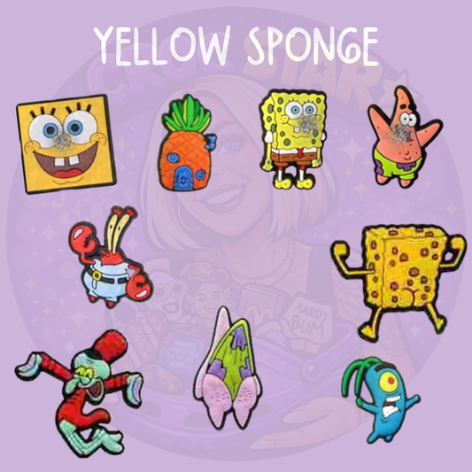 Funny yellow cartoon Croc charms featuring a sponge character, starfish, red crab, pineapple house, blue character and underwater designs